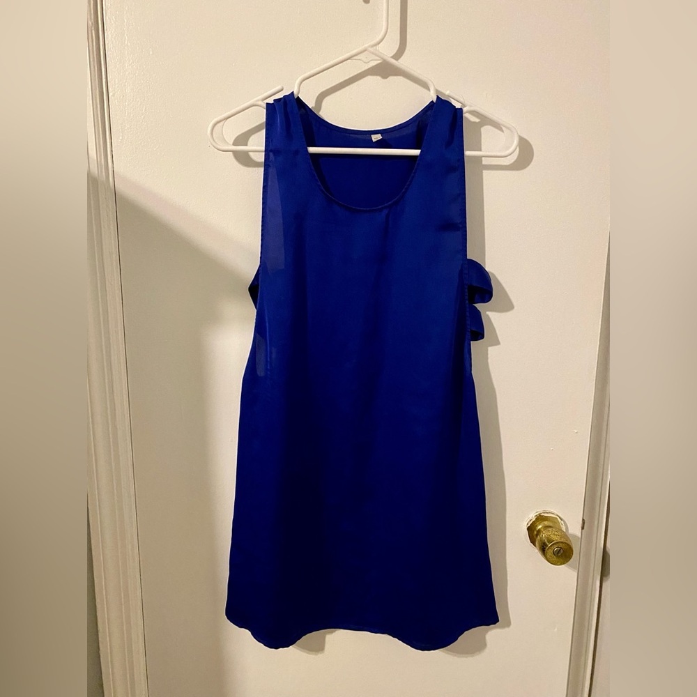 Mini blue sleeveless dress with side cutouts. Great dress for going out!